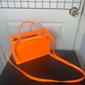 Orange crossbody w/ shoulder straps & a chain strap (wear 3 ways)